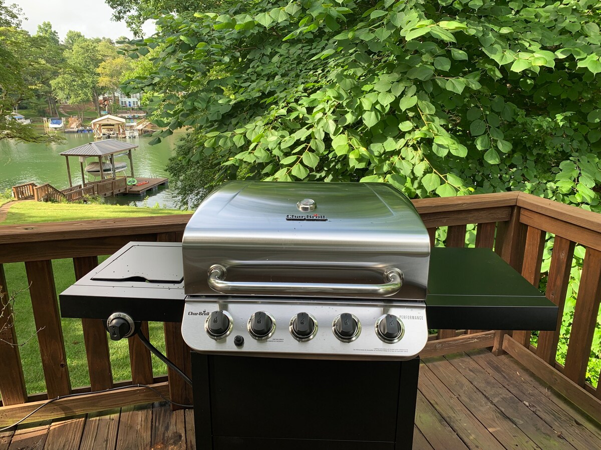 Deck with gas grill and lake views